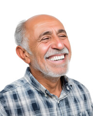 Obraz premium A joyful older man smiles broadly, radiating happiness and warmth in a relaxed indoor setting.