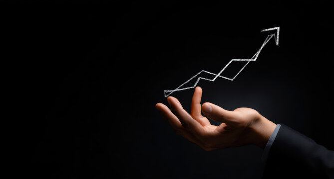 Businessman holding percentage graph symbol and up arrow. Concept of interest rate and tax calculation. Investment growth and profit. Dividend and long term investment to beat inflation