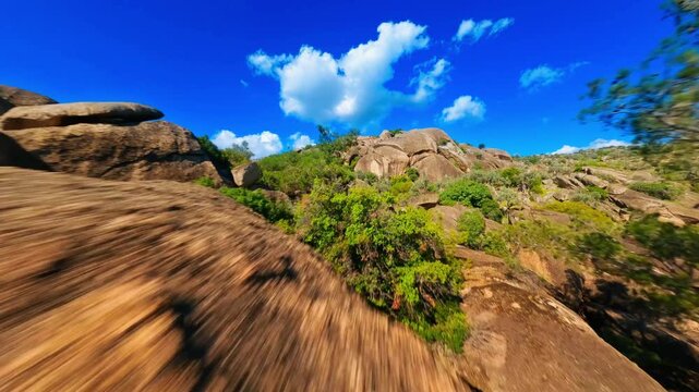 FPV Drone Flight Through Alien Rock Labyrinths Of Latmos Mountains Skimming Lake Bafa, Revealing Surreal Stone Sculptures Carved By Time In Dramatic Sunlit Landscape &mdash; 06 April 2025.