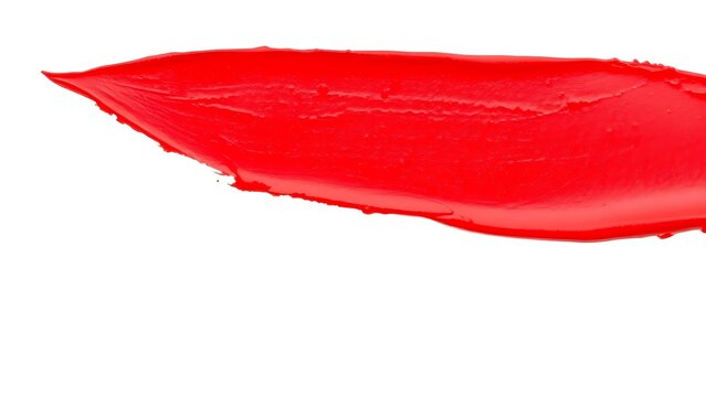 walgreens. Bright red lipstick texture smear, showcasing creamy cosmetic product detail on a clean white background. lifestyle magazines.