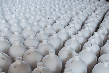 Fototapeta premium Bahrain’s traditional A’ali hand-crafted pottery. Clay pots drying.