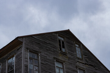 Old rustic wooden siding and architectural detail in Chonchi, Chilo&eacute;, Chile
