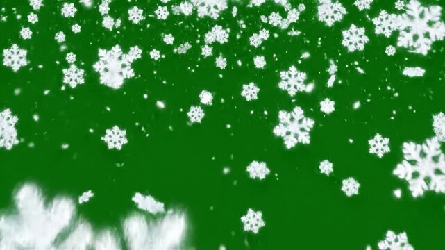 White snowflakes gently falling down against a vibrant green background