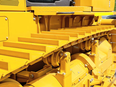 Detailed view of construction machine track components showcasing heavy-duty design and robust materials for efficient operation