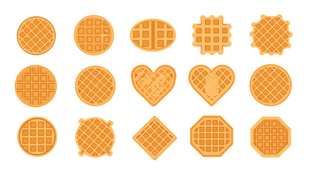 Collection of fifteen golden brown waffles in various shapes like round heart square and octagon arranged on a white background.