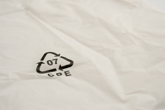 Recycle symbol 07 CPE on white plastic bag, environmental conservation and plastic waste concept