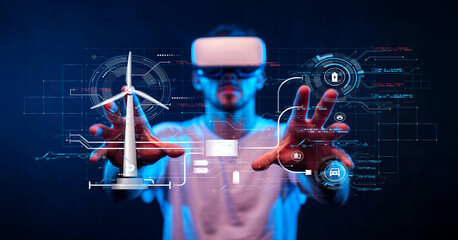 Fototapeta premium Young man exploring virtual reality technology with holographic wind turbine and digital interfaces representing sustainable energy solutions