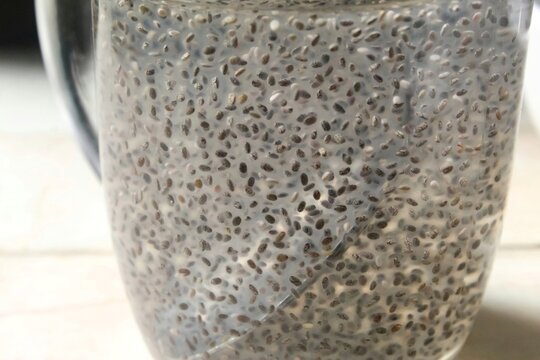 close up of chia seeds in a glass of water