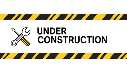 Under construction sign with tools and yellow hazard tape for website maintenance building repair or infrastructure development project update.