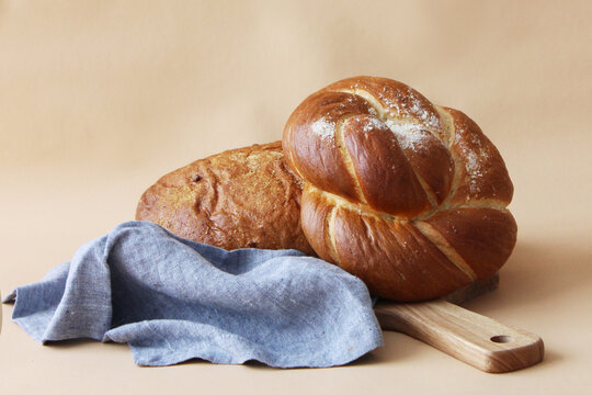 Homemade Artisan Bread Still Life on Cutting Board &mdash; Cozy Slow Living Food Trend