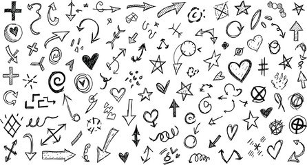 Fototapeta premium A collection of various hand drawn doodles and symbols on a white background