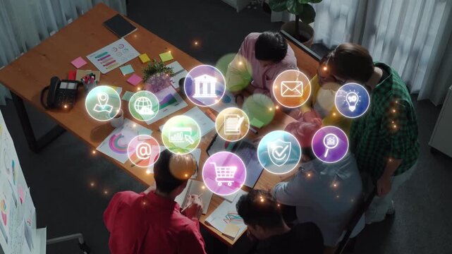 A diverse group of professionals engages in a collaborative business meeting, surrounded by digital icons symbolizing communication, analysis, and innovation in a modern workspace. Raster