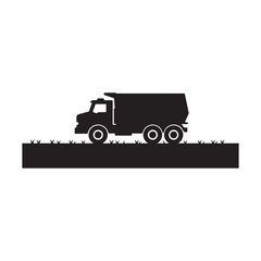 Fototapeta premium Black truck driving on road with grass side view silhouette transport vehicle