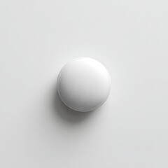 A centered white, smooth, spherical object with highlights and soft shadows on a blank background