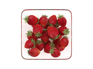Glass bowl with strawberries