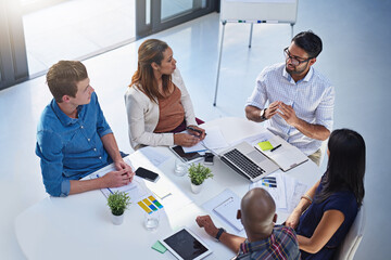 Above, teamwork and man with business people in meeting for planning, discussion and training....