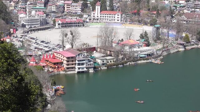 Nainital city Panoramic view in Uttarakhand surrounding the beautiful Naini Lake and Kumaon Hills.