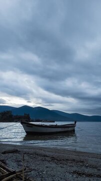 Dramatic Clouds Timelapse Over Lake Bafa With Fishing Boats. High quality 4k footage