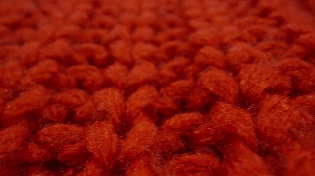 Macro Red Knitted Sweater Edge Closeup Crisp Productstyle View Of Cuff And Seam On White Background, Visible Fibers And Pile, Handcrafted Appeal For Craft And Fashion Presentation