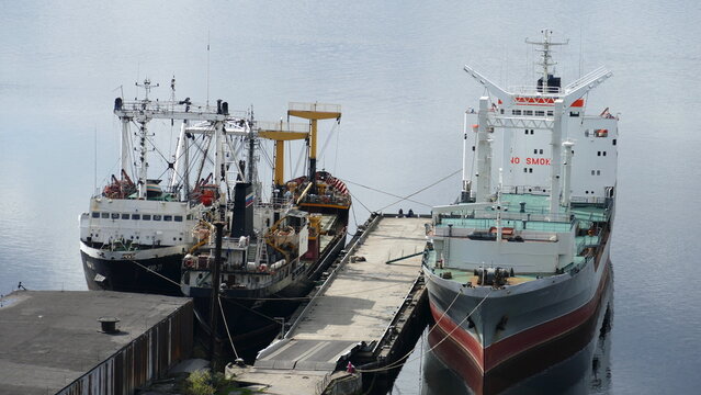 Murmansk, RUSSIA - June 25, 2017: Ships in the Kola Bay. The usual daily life of the port city. Barents Sea, Gulf Stream.