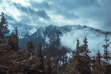 Snow-covered Rila mountain range in Bulgaria during twilight