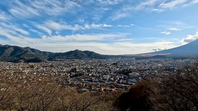 Chureito Pagoda is pagoda on the mountainside overlooking Fujiyoshida City and Mount Fuji off in the distance. The pagoda is part of the Arakura Sengen Shrine in Yamanashi Japan , Travel Footage