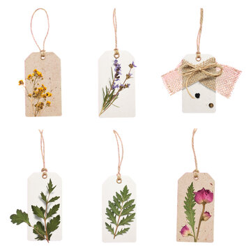 Assortment of natural handmade tags with pressed flowers and twine craft