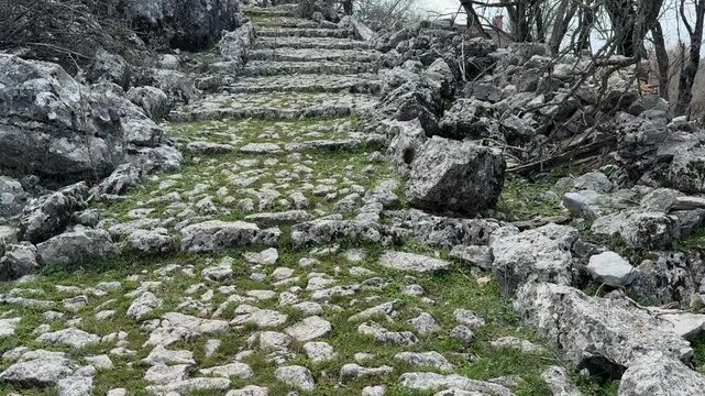 Legacy of the Past: Ancient Stone Path in Rugged Terrain