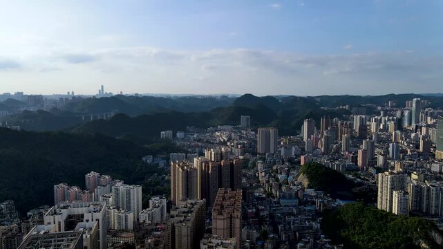 Guiyang Aerial View with Forested Mountains and Urban Development