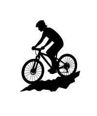Obraz premium Mountain biker silhouette riding downhill on trails
