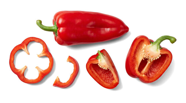 Collection of vibrant red bell pepper pieces: a whole pepper, sliced rings, a half, and wedges.