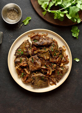 Sauteed liver with butter and onion, top view