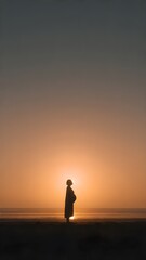Obraz premium silhouette of a man on the beach