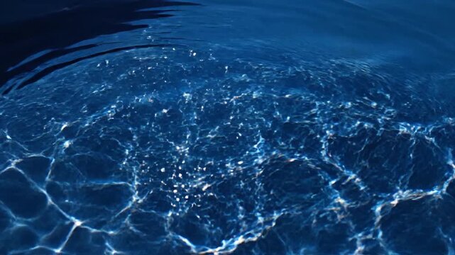 Aerial View of Ripples in Blue Water.