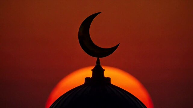 Crescent moon and dome silhouette against dramatic orange sunset sky with spiritual atmosphere.