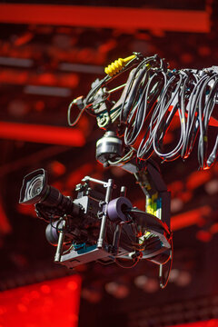 Professional Cinema Camera on Robotic Crane Jib at Concert Stage with copy space