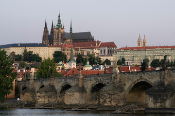 Obraz premium Panoramic view from the Vltava River to the historic Prague Castle in the morning sun. Prague,Czech Republic.
