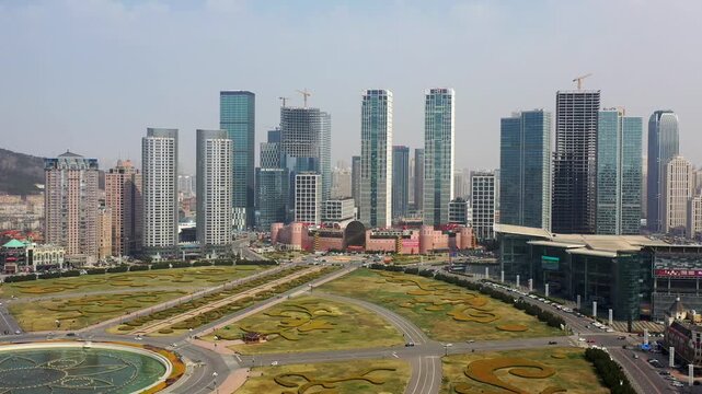 Dalian Xinghai Square with Modern Skyline and Green Landscape