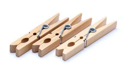Wooden clothespins on white background; laundry day essentials in natural wood