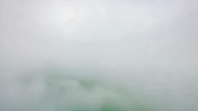 Abstract light grey gradient background with subtle green underscores for modern designs and creative projects