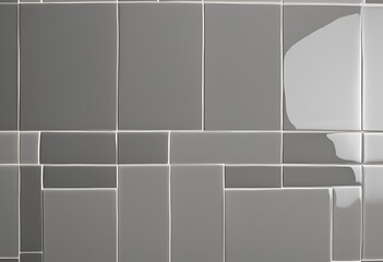 Smooth glossy gray wall tiles reflecting modern interior light.