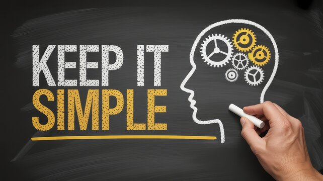 Hand drawing Keep It Simple message on blackboard with human head and gears illustration