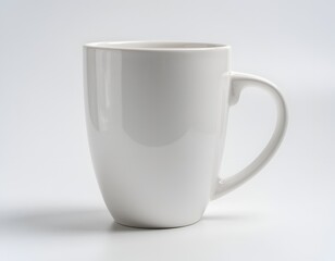 Obraz premium Ceramic mug on white backdrop for coffee or tea break minimalist studio style