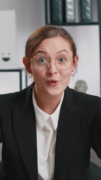 Excited amazed Caucasian business woman freelancer looking shocked surprised wow showing hands brain head explosion gesture at home office workplace. Worried lady touching head, showing explosion