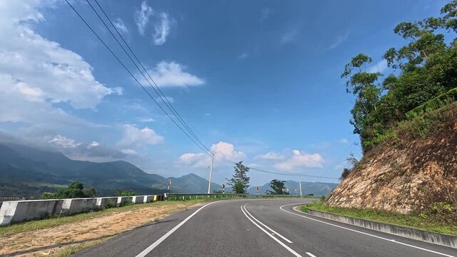 Cinematic POV of Winding Mountain Road at Munnar Gap Road, Kerala, India