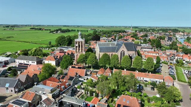 Historic church tower and surrounding urban landscape in Europe.