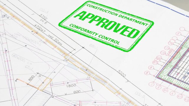 Design Drawing Approval. A stamp is placed on the design drawing and leaves an ink imprint symbolizing compliance with standards and building permission