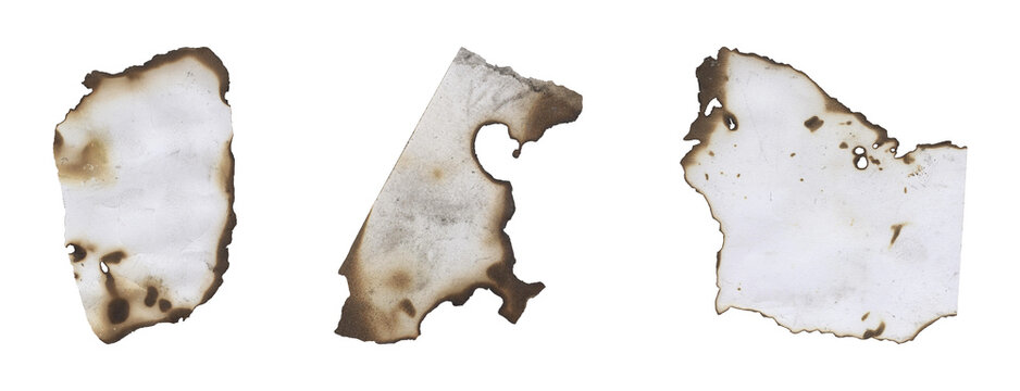 Ancient scorched paper fragments with heavy burn marks for overlaying