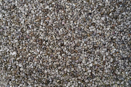 Gravel path seen from above. Fine gravel seen from above. Background of small stones