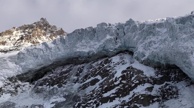 Chamonix mountain icefall breaks away from glacier face